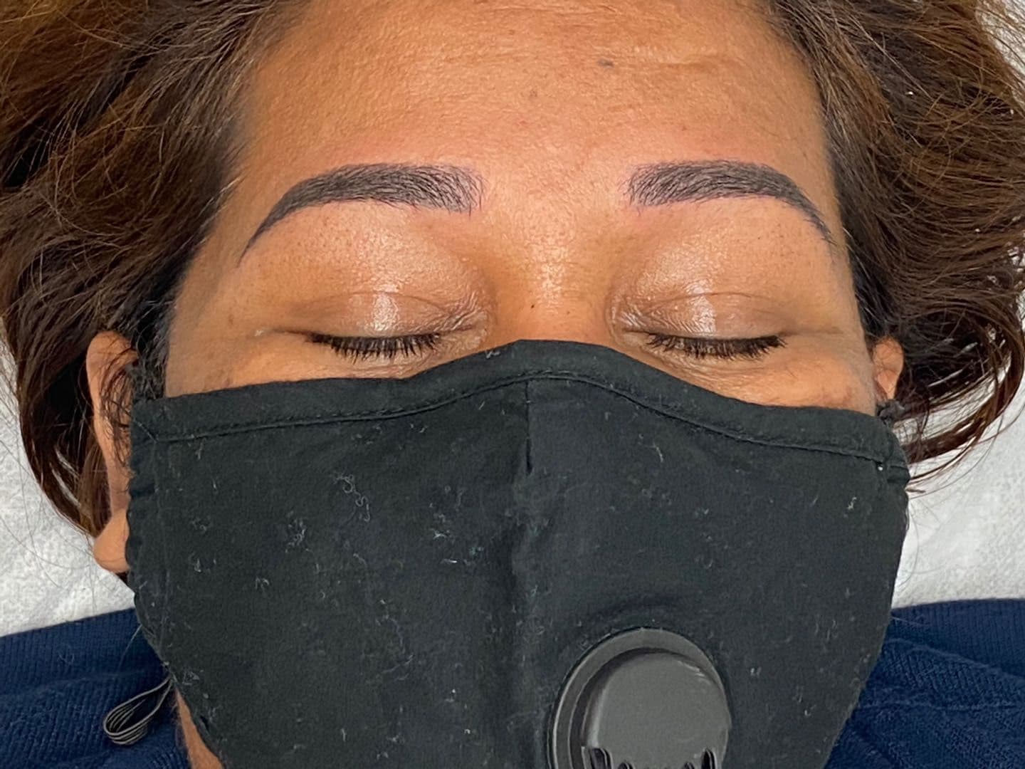 Client eyebrow result with softly shaded, symmetrical definition